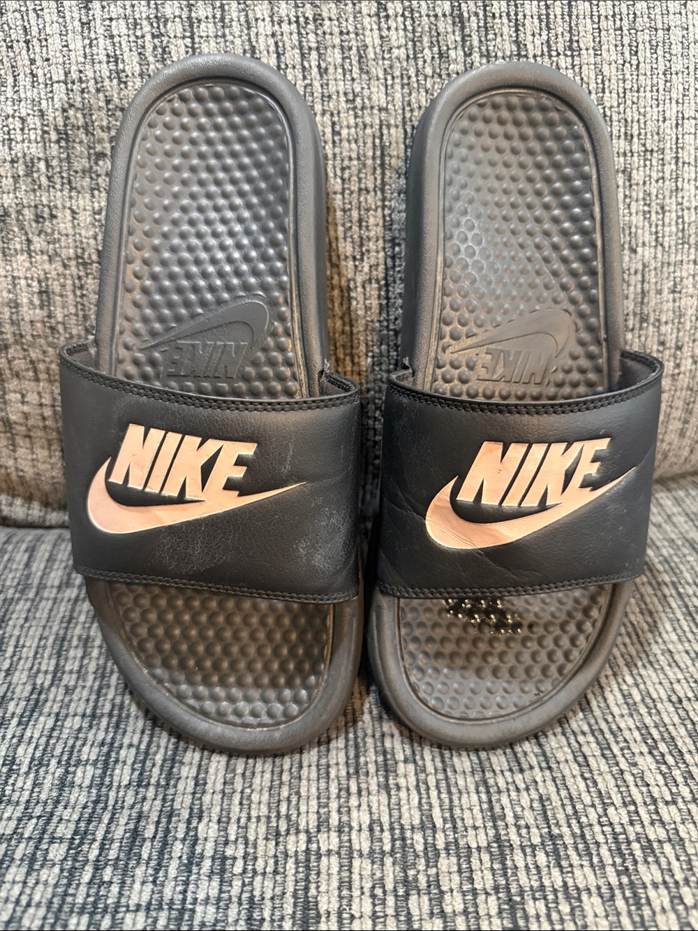 Nike Black Slides with Metallic Rose Logo